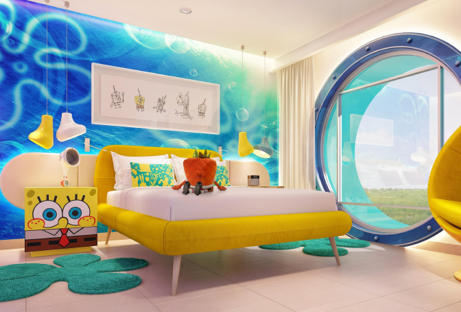 Vista exterior del Hotel Nickelodeon en Quintana Roo, México, destacando su arquitectura única y las comodidades que ofrece a los huéspedes, con una piscina temática, restaurantes exclusivos y entretenimiento para toda la familia.